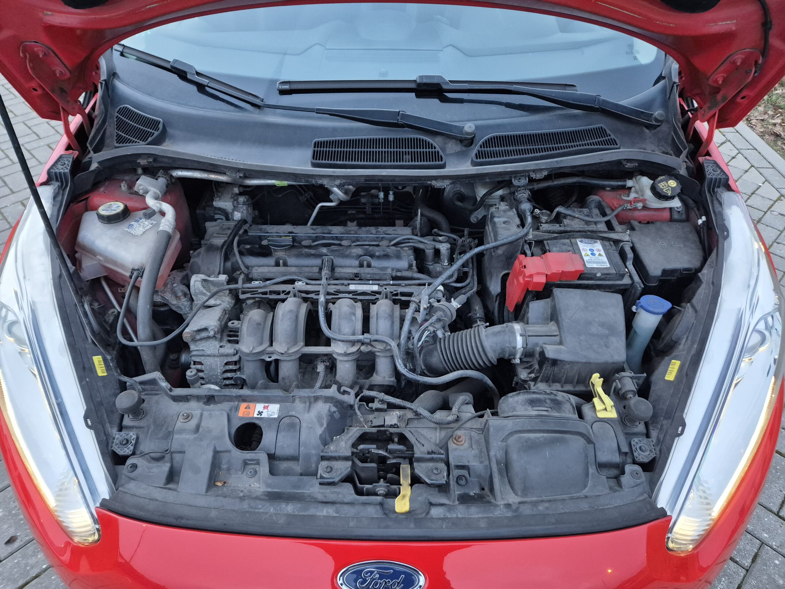 Ford Fiesta 1.25i ST-Line / 2015 / Airco / Cruise Control / Stoelverwarming / Led / 18 inch / Racing Red - Afbeelding 25