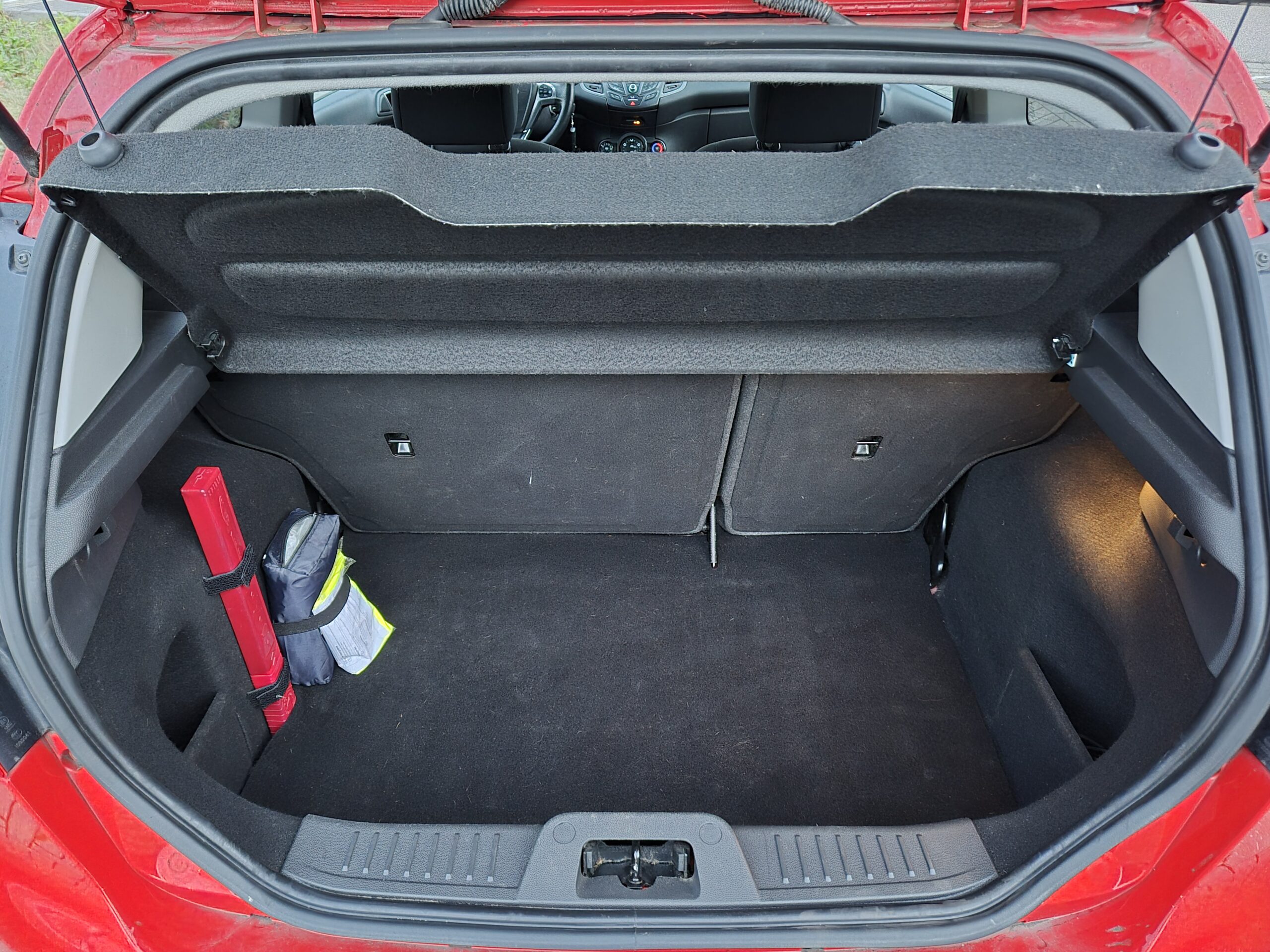 Ford Fiesta 1.25i ST-Line / 2015 / Airco / Cruise Control / Stoelverwarming / Led / 18 inch / Racing Red - Afbeelding 26